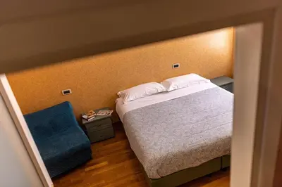 Letto o letti in una camera di Hotel Mary