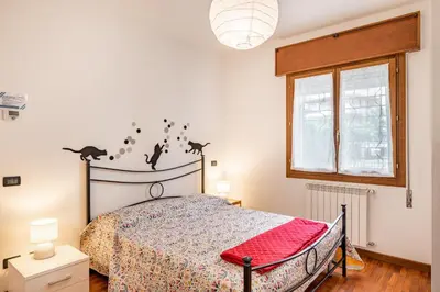 Letto o letti in una camera di GuestHost - Padova Ospedali Apartment