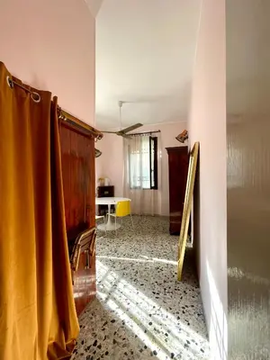 Area soggiorno di Venetian pink apartment in Dorsoduro