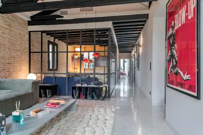 Area soggiorno di Ca' Delle Carrozze Stylish 2 Bedroom loft-style