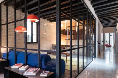 Area soggiorno di Ca' Delle Carrozze Stylish 2 Bedroom loft-style