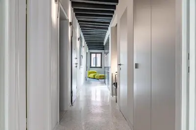 Letto o letti in una camera di Ca' Delle Carrozze Stylish 2 Bedroom loft-style
