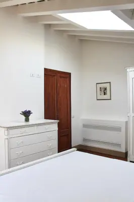 Letto o letti in una camera di Villa Trieste M