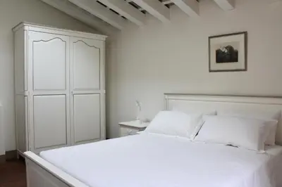 Letto o letti in una camera di Villa Trieste M