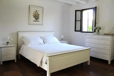 Letto o letti in una camera di Villa Trieste M