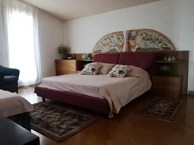 Letto o letti in una camera di ABC Rooms
