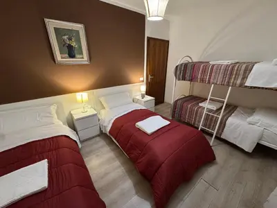 Letto o letti in una camera di Harry's Canal View
