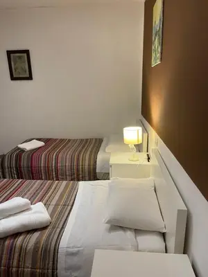 Letto o letti in una camera di Harry's Canal View