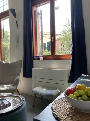 Area soggiorno di mini loft Lido with own sunny & private garden
