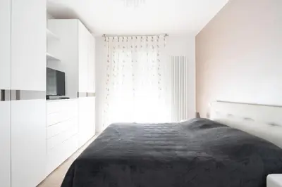 Letto o letti in una camera di Finisterrae 5 - Immobiliare Living