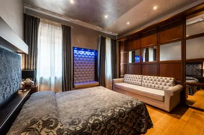 Letto o letti in una camera di Hotel Abbazia