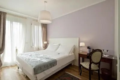 Letto o letti in una camera di Chiara - Lodge