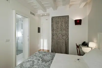 Letto o letti in una camera di Chiara - Lodge