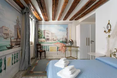 Letto o letti in una camera di Appartamento S. Maurizio - Venezia