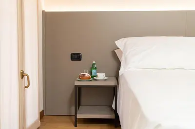 Letto o letti in una camera di Gustificio
