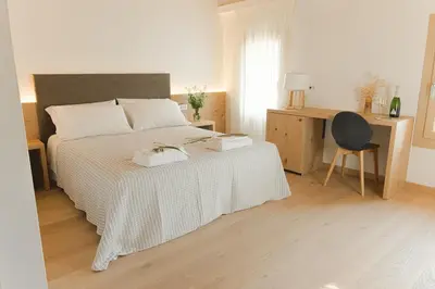 Letto o letti in una camera di Casa Vettor