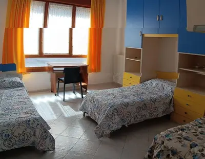 Letto o letti in una camera di Casa Tiro