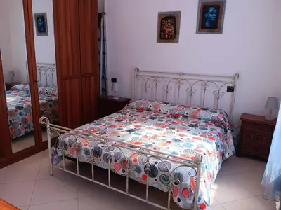 Letto o letti in una camera di Casa Tiro