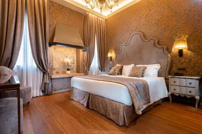Letto o letti in una camera di Hotel Canaletto