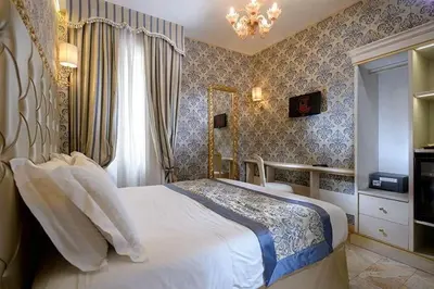 Letto o letti in una camera di Hotel Canaletto