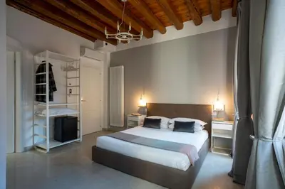 Letto o letti in una camera di Foscà Venice Rooms