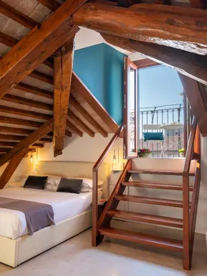 Letto o letti in una camera di Foscà Venice Rooms