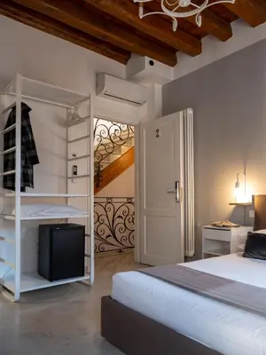 Letto o letti in una camera di Foscà Venice Rooms