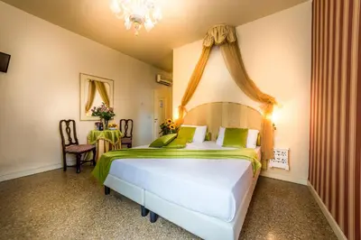 Letto o letti in una camera di Alloggi Acquavita - checkin at 