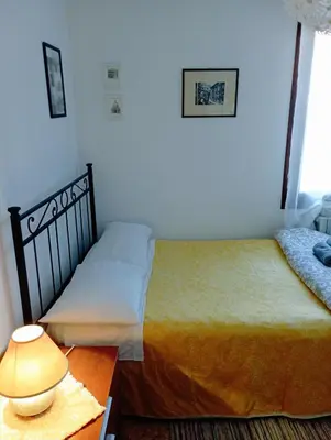 Letto o letti in una camera di Two Steps from Rialto