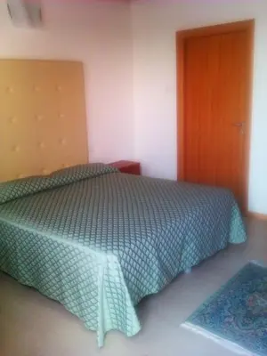 Letto o letti in una camera di Agriturismo la Chioccia