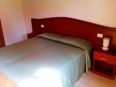 Letto o letti in una camera di Agriturismo la Chioccia