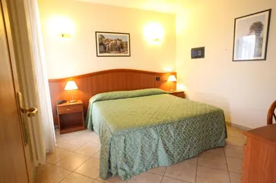 Letto o letti in una camera di Albergo Alla Campana