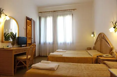 Letto o letti in una camera di Hotel Villa Orio & Beatrice