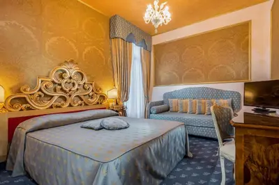 Letto o letti in una camera di Hotel Giorgione