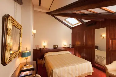 Letto o letti in una camera di Hotel Palazzo Stern