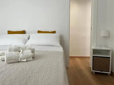 Letto o letti in una camera di Ca' Yvonne alloggio a Lido di Venezia