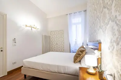 Letto o letti in una camera di Residenza Centopietre - Dorsoduro by Wonderful Italy