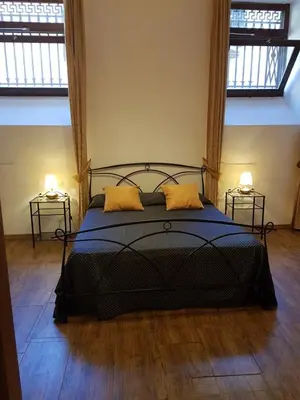 Letto o letti in una camera di Sarlette Cozy Room