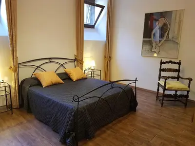 Letto o letti in una camera di Sarlette Cozy Room