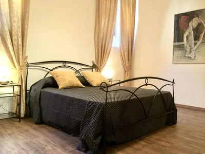 Letto o letti in una camera di Sarlette Cozy Room