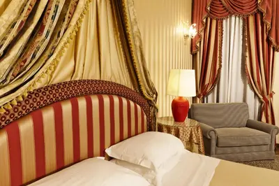 Letto o letti in una camera di Ca' Bragadin e Carabba