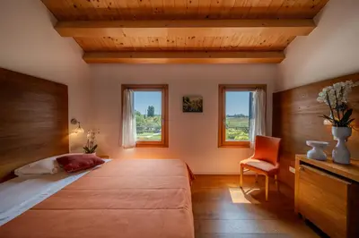 Letto o letti in una camera di Borgo Ronchetto