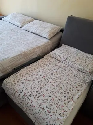 Letto o letti in una camera di NEL CUORE DI PADOVA PER 2 - 028060-LOC-01359
