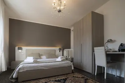 Letto o letti in una camera di Al Portico Guest House