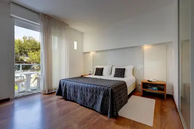 Letto o letti in una camera di Park Hotel Ermitage Resort & Spa