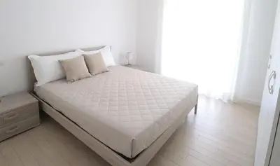 Letto o letti in una camera di Finisterrae 1 - Immobiliare Living