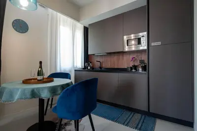 Cucina o angolo cottura di Officine Cavour - Appartamenti la Quercia