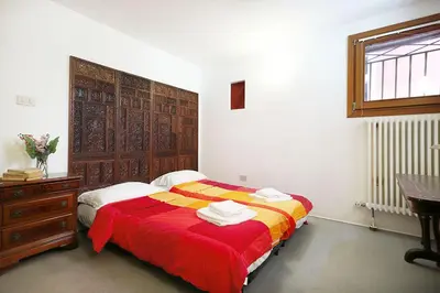 Letto o letti in una camera di Venetians loft Moschette