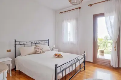 Letto o letti in una camera di Le Vigne del Gallo