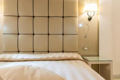 Letto o letti in una camera di Hotel Campiello